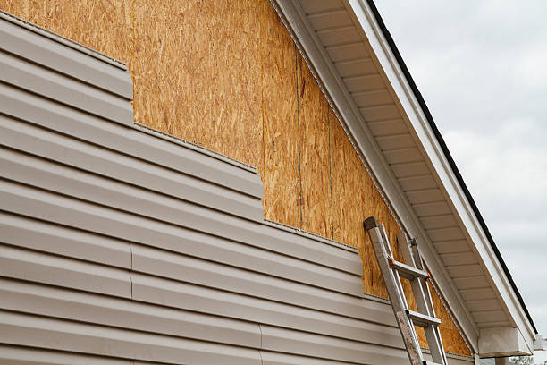 Professional Emergency Siding Repair technician working in Spring Mills, PA